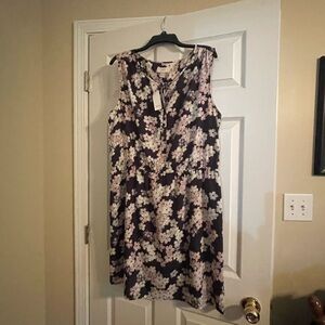 Women’s CL sleeveless dress. Dark blue floral print. Fully lined. Brand new.